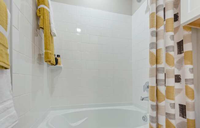 shower area of an apartment at ironridge at hill country village