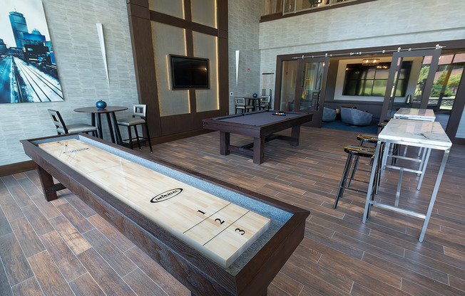 Challenge your friends to a game of shuffleboard or pool