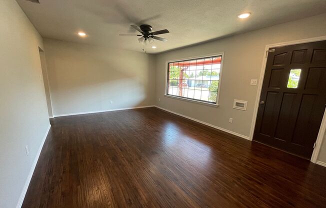 Captivating 3 Bedroom 1 Bathroom Home w/ REAL Refinished Hardwood Floors~ NEW Paint Through Out Home ~ Private Wood Fenced w/ Large Backyard &  Porch ~~ Storage ~~ Gorgeous Kitchen w/ Custom Cabinets ~~1 Car Attached Garage ~~Ready Now so Lease Today!!~~