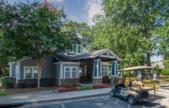 a golf cart parked in front of the leasing center at Wynnwood Vinings