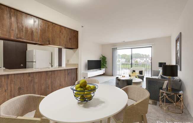 a kitchen and living room with a white table and chairs and a bowl of fruit on the