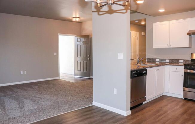 a kitchen with a wood floor