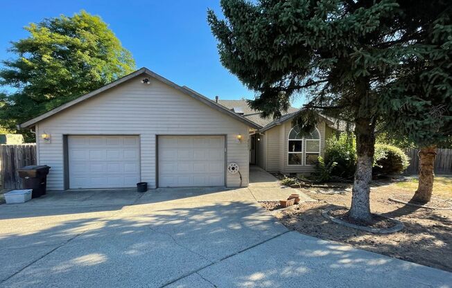 Don't Miss This West Linn Beauty! Formal Living Room~ Entertainer's Kitchen~ Double Fireplace~ Large Deck with Two Sliders~ Two Car Garage~ Large Fenced yard and MUCH MORE!