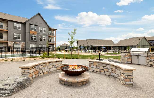 the preserve at ballantyne commons community fire pit with apartments in the background