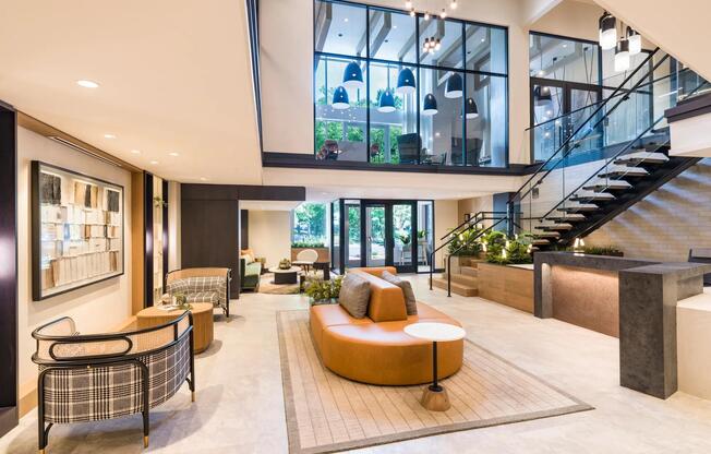 Flooded with natural light and filled with mid-century flair, this welcoming lounge invites you to relax, connect, or simply take it all in.