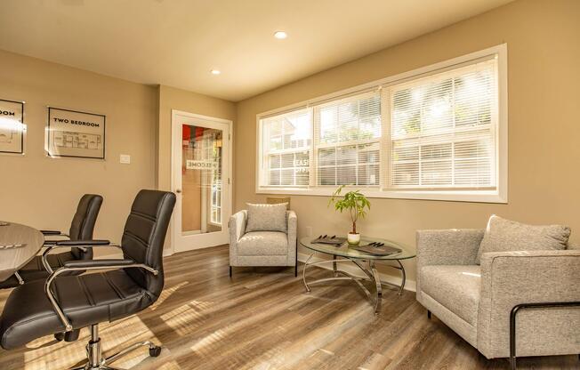 a living room filled with furniture and a flat screen tv