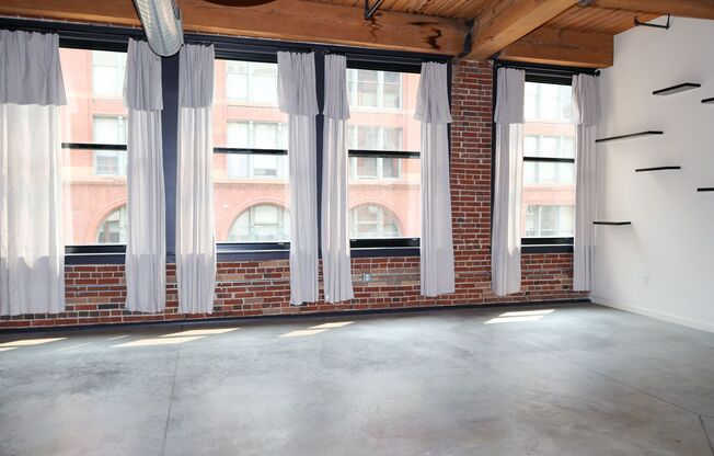 Live in the Heart of the Downtown Loft District! Dorsa Lofts #402