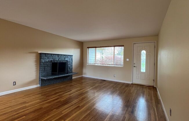 Well maintained 4 BD 1.75 BA Home with Genuine Hardwood Floors & Private Fully Fenced Backyard
