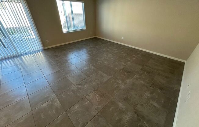 Gorgeous two-story home with 5 bedrooms and 3 bathrooms in a gated community