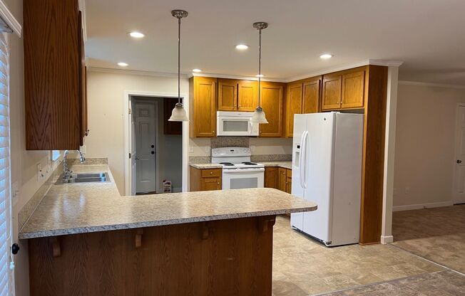 Spacious 3 Bed/2 Bath Ranch Style Home - Large Lot - NO HOA - Storage Shed - Large Driveway - Plenty of Parking