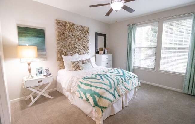 The Crest at Laurel Canyon model apartment home bedroom with ceiling fan located in Canton,GA