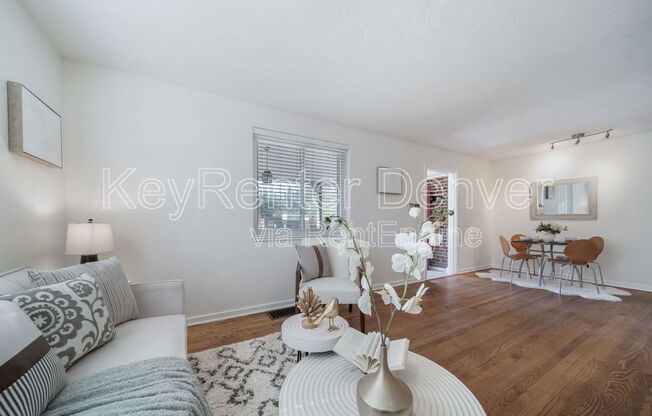 7275 E 8 AVE
