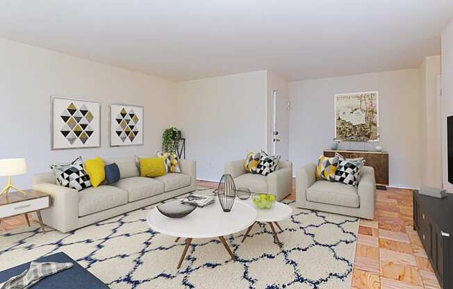 living area with coffee table, social seating, tv, credenza and hardwood flooring at fort totten apartments in washington dc