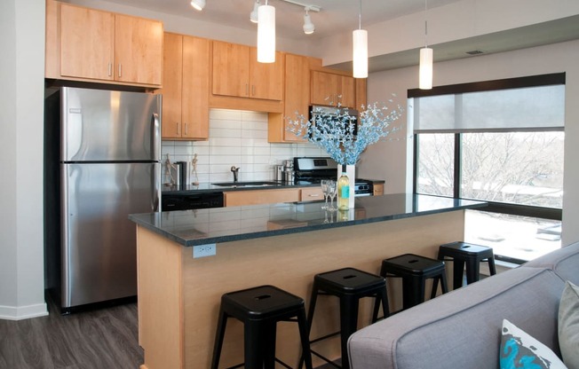 Kitchen with stainless steel appliances and granite countertops