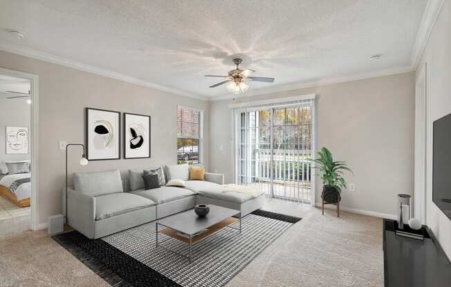 Model living room with sliding glass door