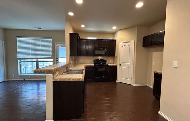 2 Story Unit / Washer, Dryer Connections on 1st Floor / Fenced in Yard / CISD