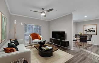 a living room with grey walls and a white couch