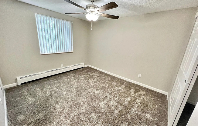 Experience serene living in this well-lit and cozy bedroom, designed for ultimate relaxation.