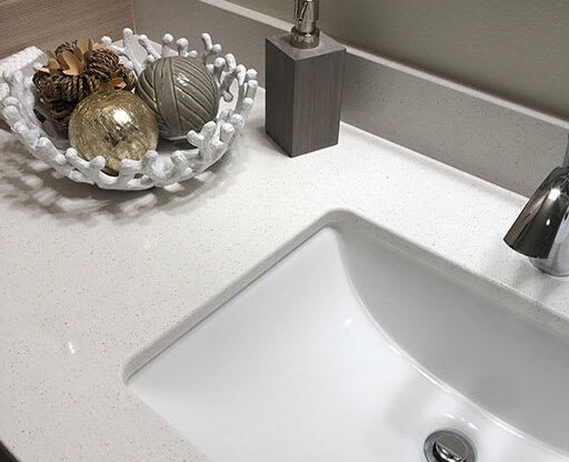 Bathroom quartz counter top and sink at Harbor Heights 55+ Community, Olympia