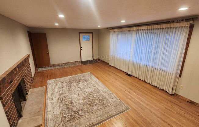 3 bd 2ba Ranch Style Home with Fenced Yard, W/D in Unit, Fireplaces & 2 Car Garage!