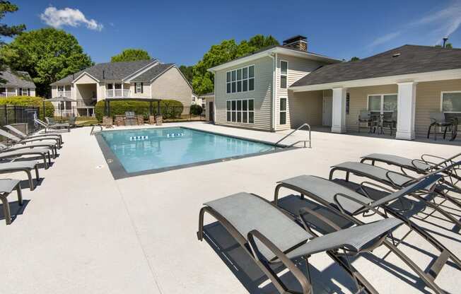 our apartments have a large pool and lounge chairs
