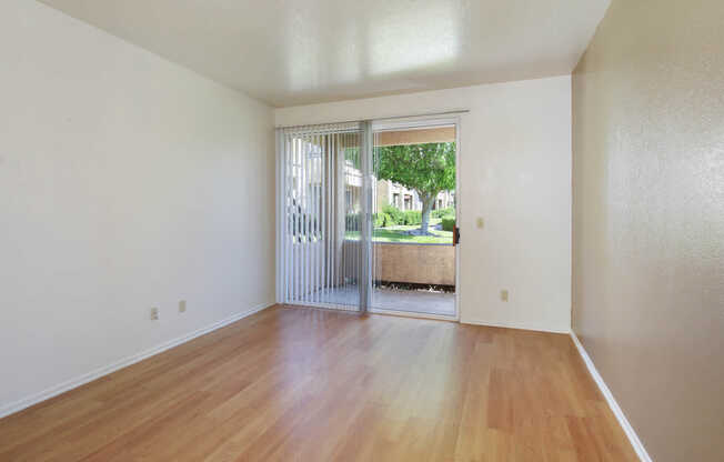 Living Room with Patio and Hard Surface Flooring