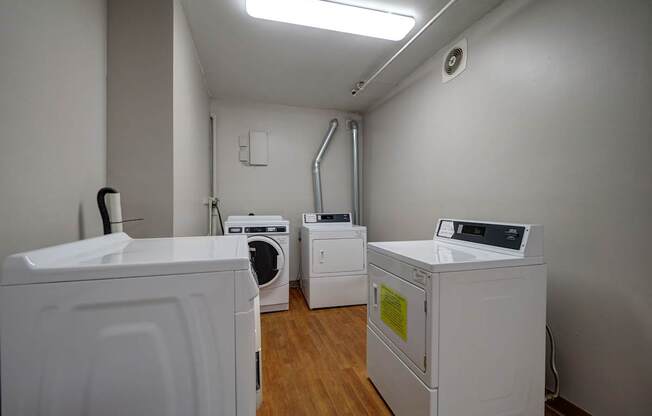 A laundry room with a washer and dryer.