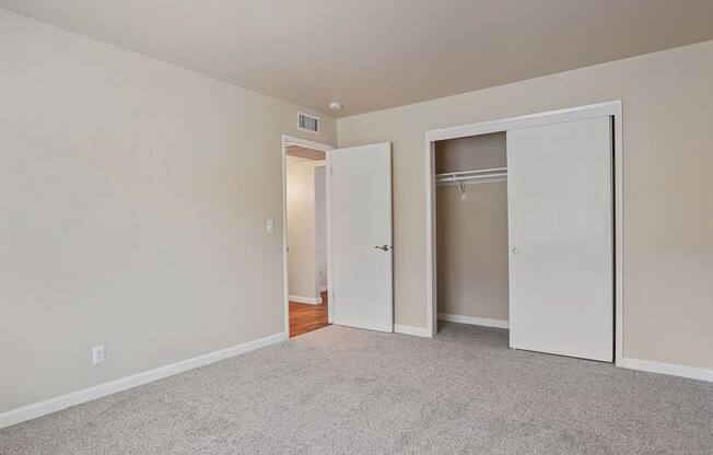 Carpeted Bedroom Area at Parkside Apartments, Davis