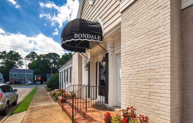 A building with a black awning that says "BONDALE" is shown.