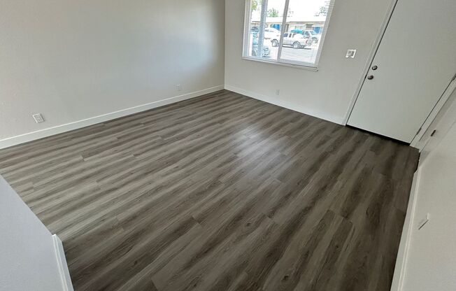 BEAUTIFULLY UPDATED HOME FEATURES 3 BEDROOM AND 1 BATH BRAND-NEW LUXURY VINYL PLANK FLOORING THROUGHOUT