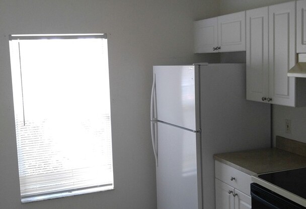 Spacious 2/2 with garage in family neighborhood