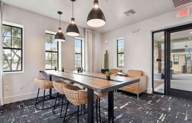 A conference room with a long table and chairs. at The Laurel Apartments, Chandler Arizona