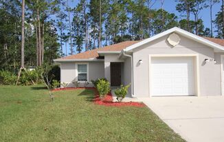 Gorgeous 3 Bed 2 Bath Duplex Home in Lehigh Woods of Palm Coast!