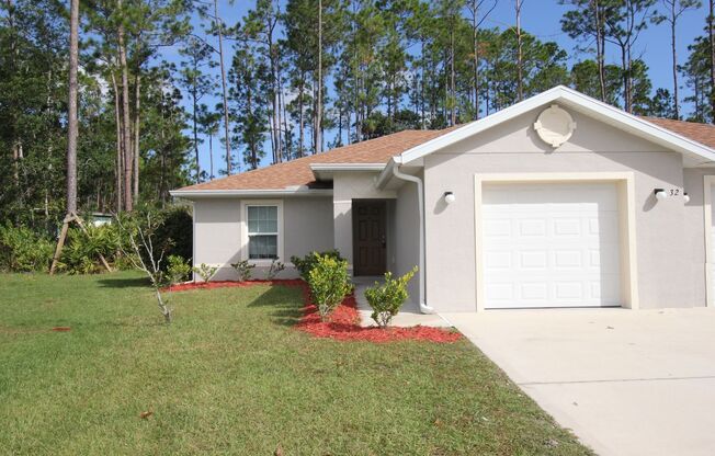 Gorgeous 3 Bed 2 Bath Duplex Home in Lehigh Woods of Palm Coast!