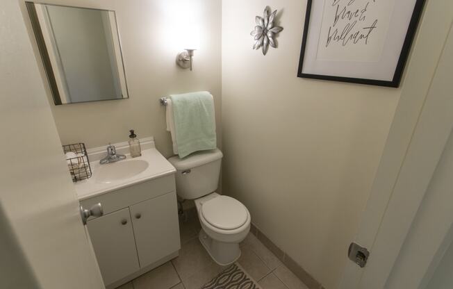 This is a photo of the bathroom in the 740 square foot 1 bedroom model apartment at Compton Lake Apartments in Mt. Healthy, OH.