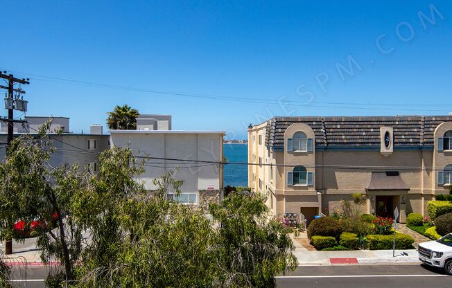 2BR with Large Parking Space ~ 1 Block from the Water!