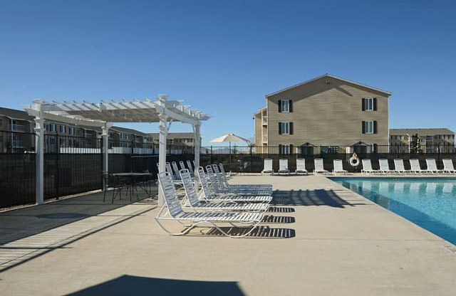 Swimming Pool And Relaxing Area at Van Horne Estates Apartments, Texas
