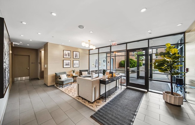 A reception area with a desk and chairs.