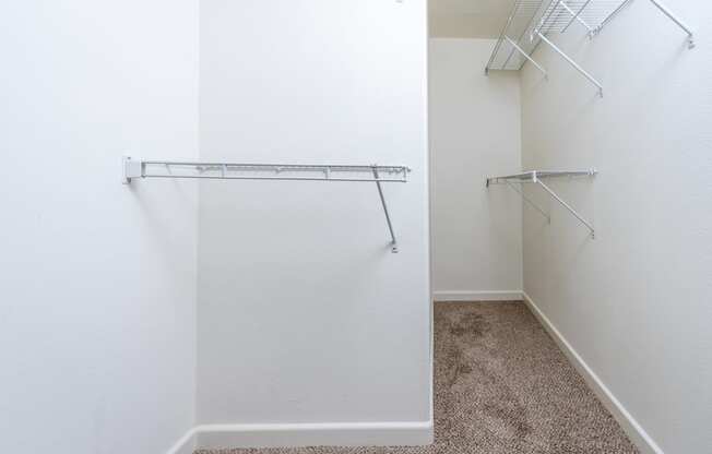 a walk in closet in a 555 waverly unit