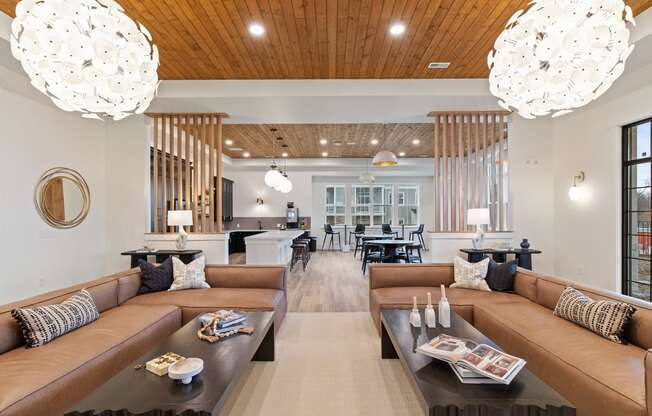 Large living room with couches and tables at Hadley Place Apartments, Pennsylvania, 17025