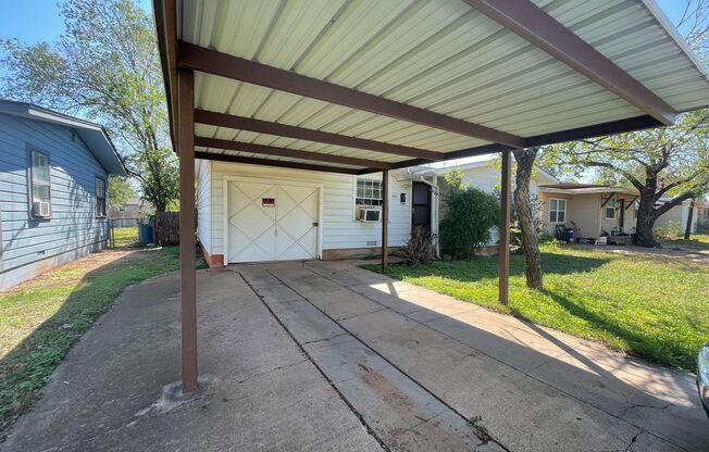 Adorable 2 Bedroom with Attached Garage, Covered Parking & More!