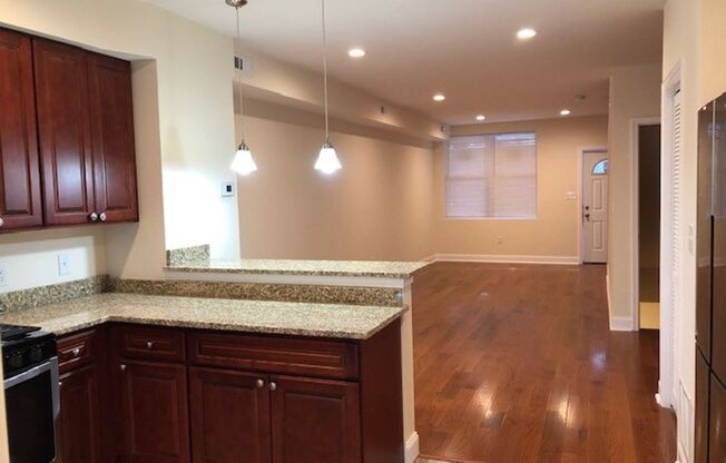 2-Bedroom Townhome with Finished Basement + Covered Front Porch & Parking