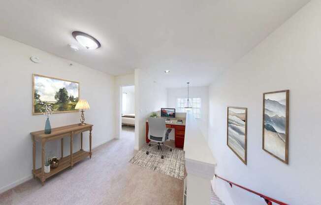 A room with a table, chairs, and pictures on the wall.