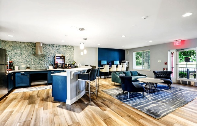 a living room with a kitchen and a dining room