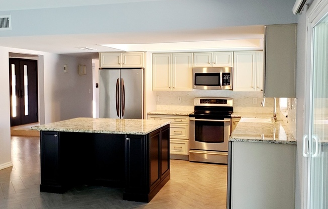 COMING SOON! NO HOA-Stunning 3 Bedroom with Den and Crystal Clear Pool!