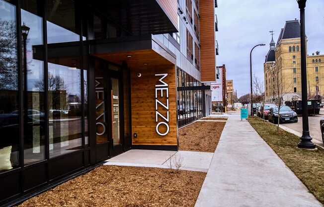 The entrance to a building with the word "MEZZO" on it.
