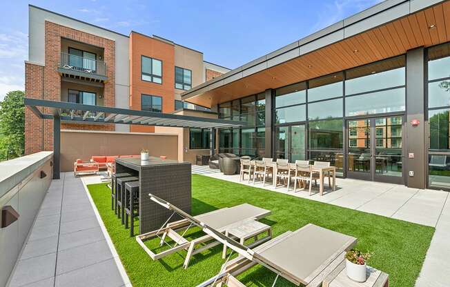 Exton apartment roof-top lounge with fire pits at Keva Flats