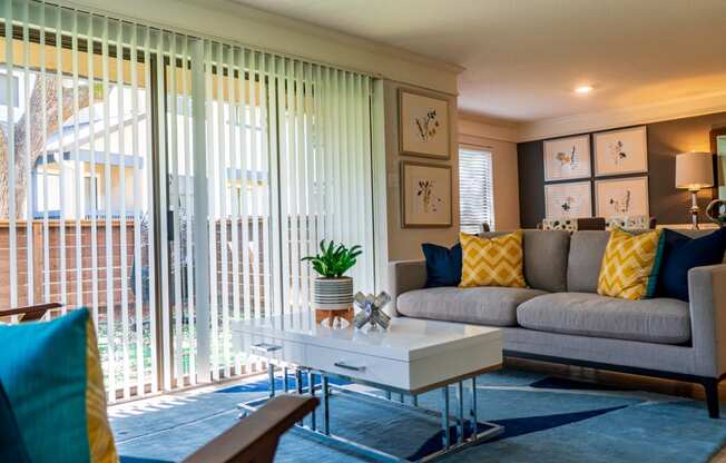 a living room with a couch and a coffee table