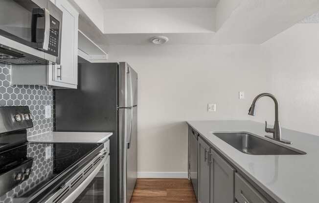 the preserve at ballantyne commons apartment kitchen with stainless steel appliances