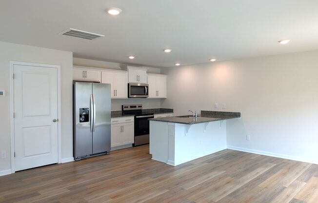 Beautiful, end-unit, townhome located in the Mallard Creek Towns Community in Charlotte!
